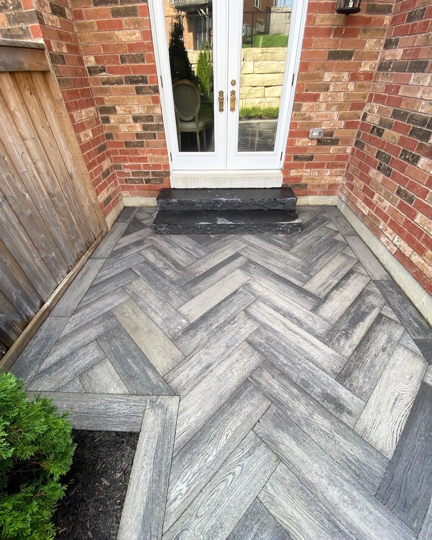 The Mapleview Courtyard — herringbone natural stone patio, Barrie Ontario