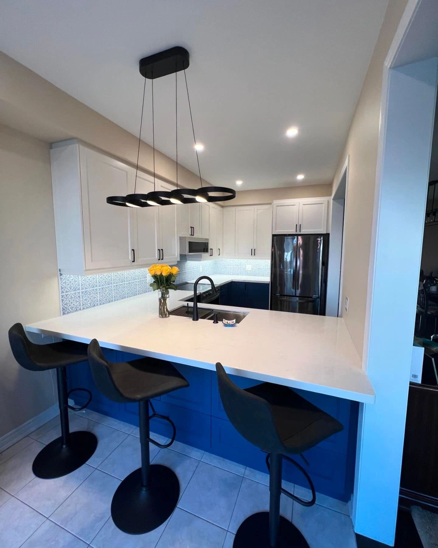 The Wood Residence — custom kitchen renovation with navy and white cabinetry